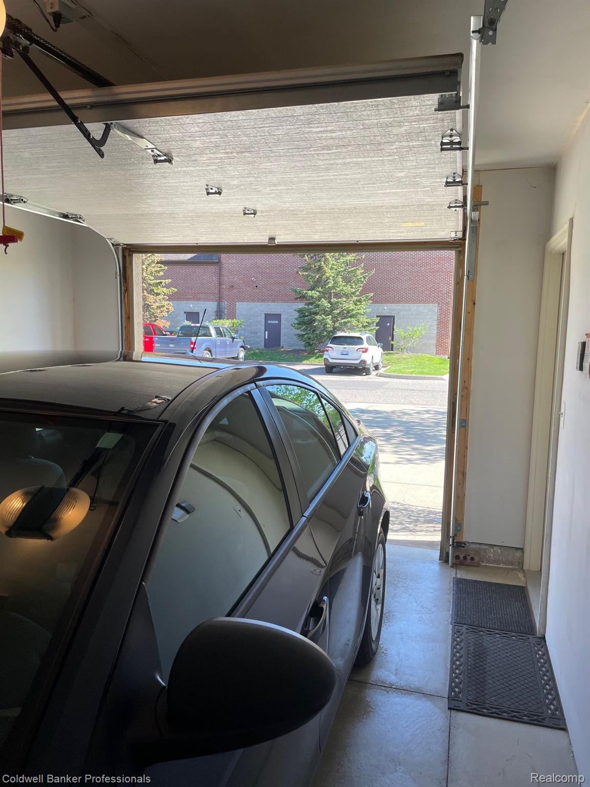 11716 Farmington Road Livonia, MI 48150 - Photo 22 of 26 1 car attached garage w/extra storage.