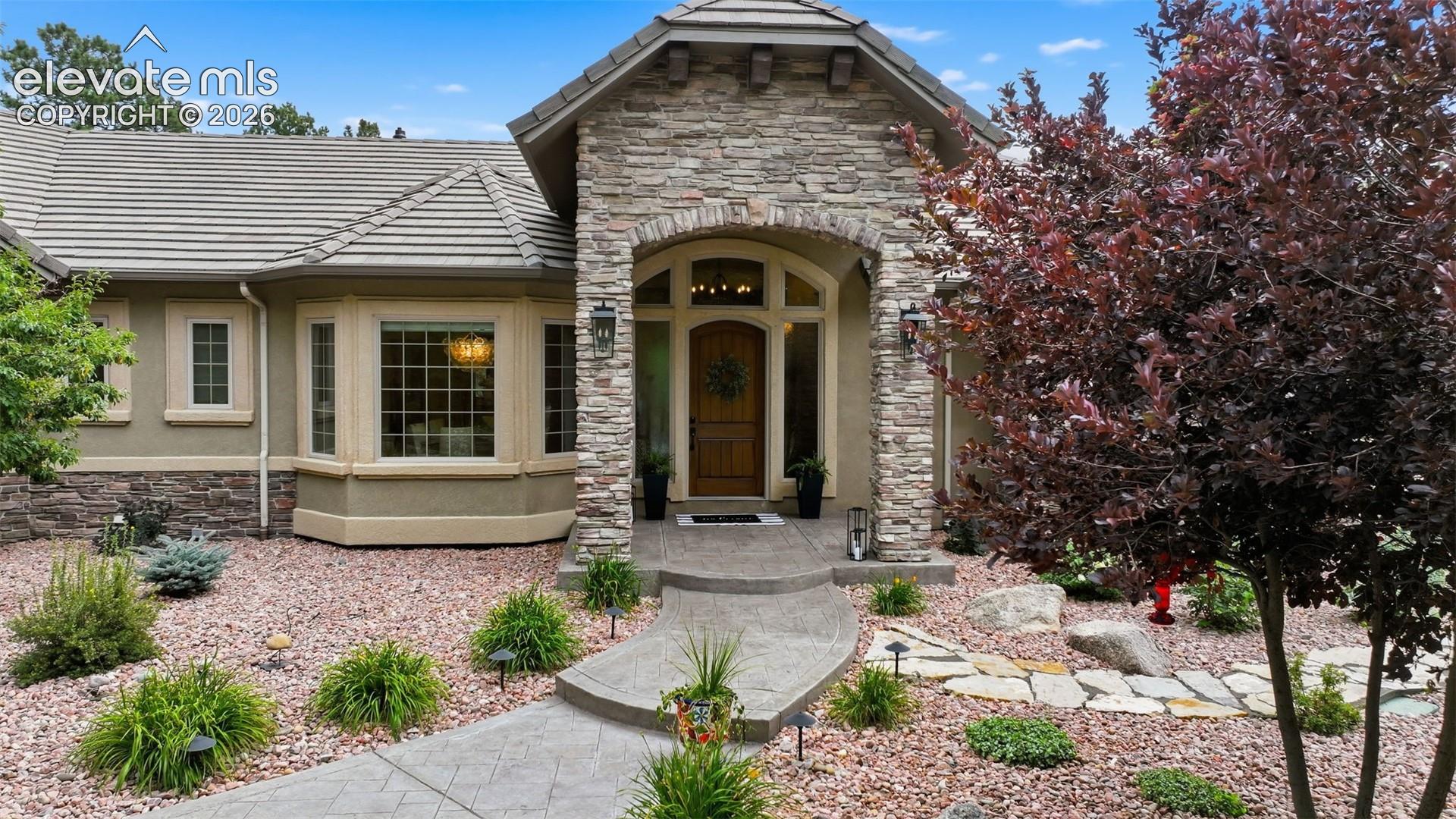 4865 Hidden Rock Road Colorado Springs, CO 80908 - Photo 3 of 50 Welcoming covered private entry!