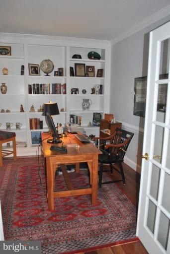 509 Brindley Place Southwest Leesburg, VA 20175 - Photo 29 of 30 Main Floor Library w/ Lited Doors and Built-ins