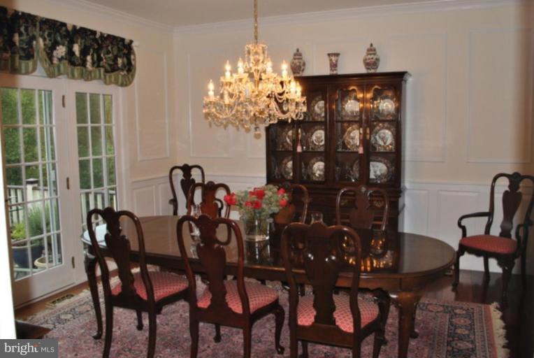 509 Brindley Place Southwest Leesburg, VA 20175 - Photo 10 of 30 Triple French Doors and Oversized Mouldings