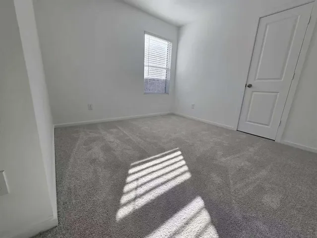 a view of a livingroom with a window
