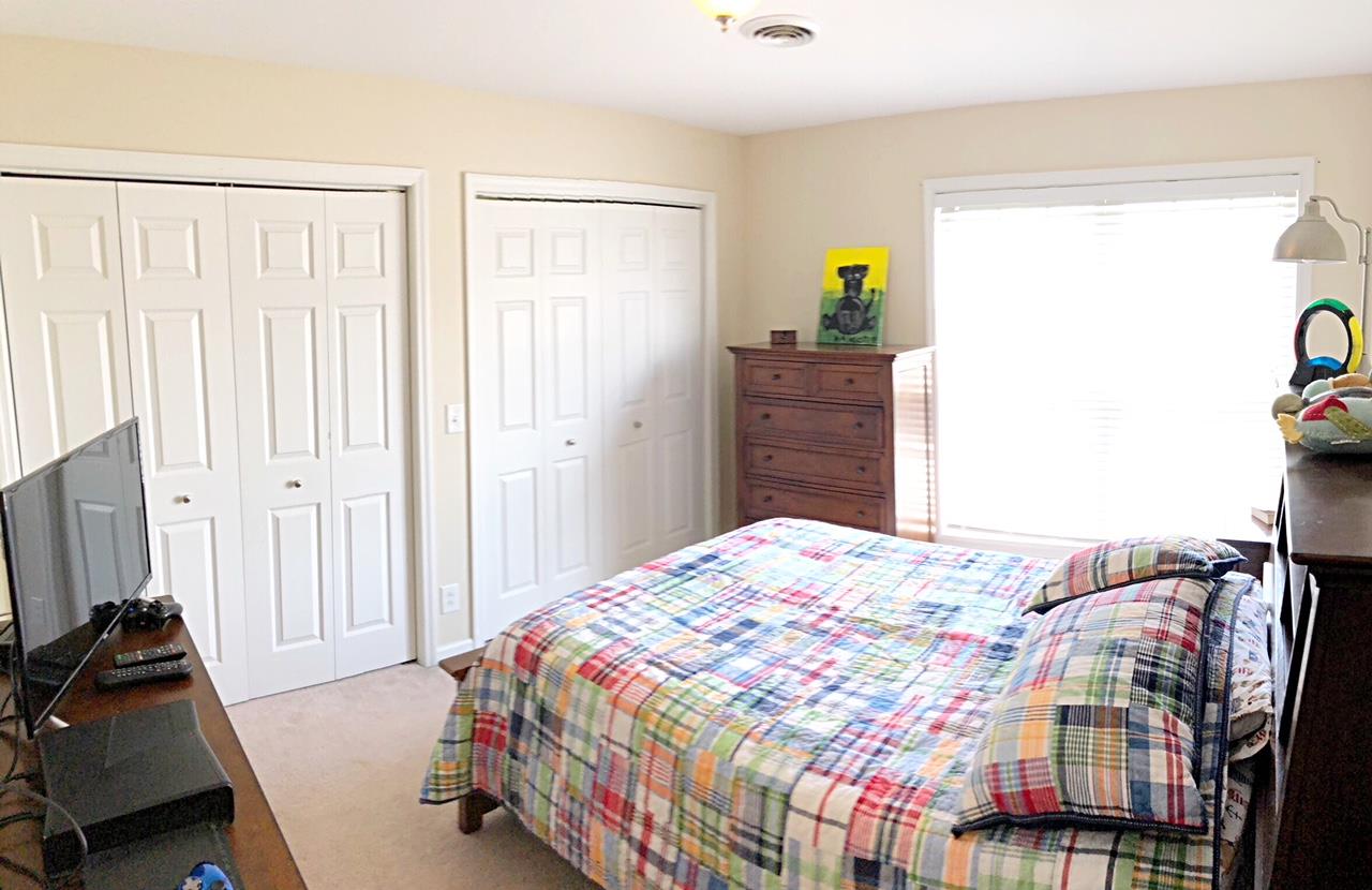 125 West Hester Road Cottontown, TN 37048 - Photo 14 of 28 a bedroom with a bed and a window