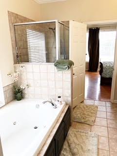 125 West Hester Road Cottontown, TN 37048 - Photo 17 of 28 a bathroom with a tub sink and mirror