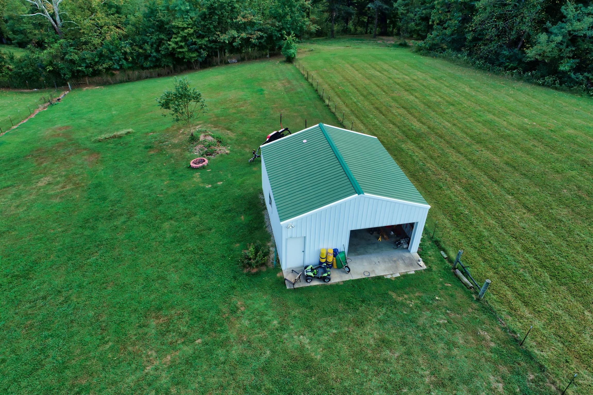 125 West Hester Road Cottontown, TN 37048 - Photo 27 of 28 a view of a wooden fence and a backyard