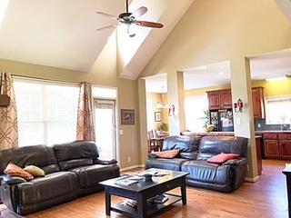 125 West Hester Road Cottontown, TN 37048 - Photo 5 of 28 a living room with furniture and a large window