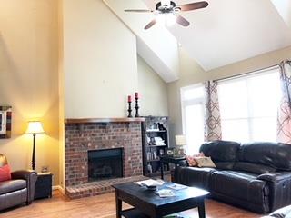 125 West Hester Road Cottontown, TN 37048 - Photo 8 of 28 a living room with furniture and a fireplace