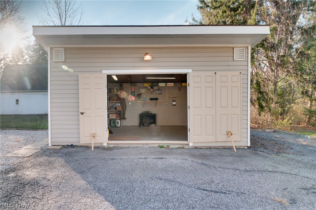 11516 Girdled Road Painesville, OH 44077 - Photo 24 of 24 This outbuilding provides additional storage and has a work bench.