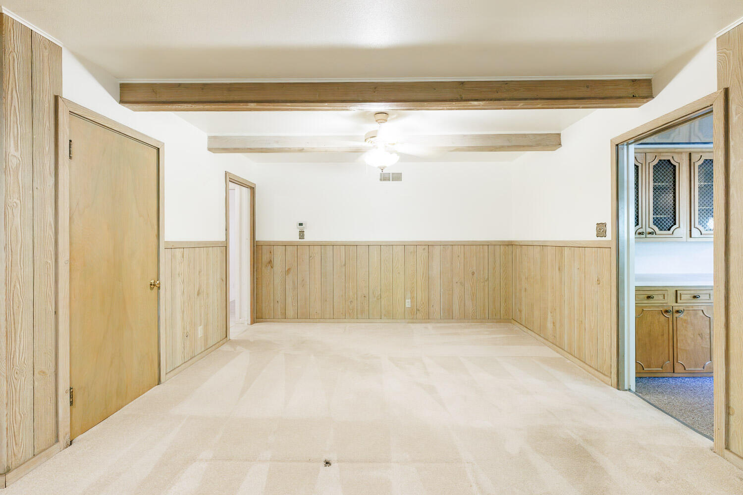 3308 37th Street Lubbock, TX 79413 - Photo 23 of 54 a view of a big room with closet and wooden floor