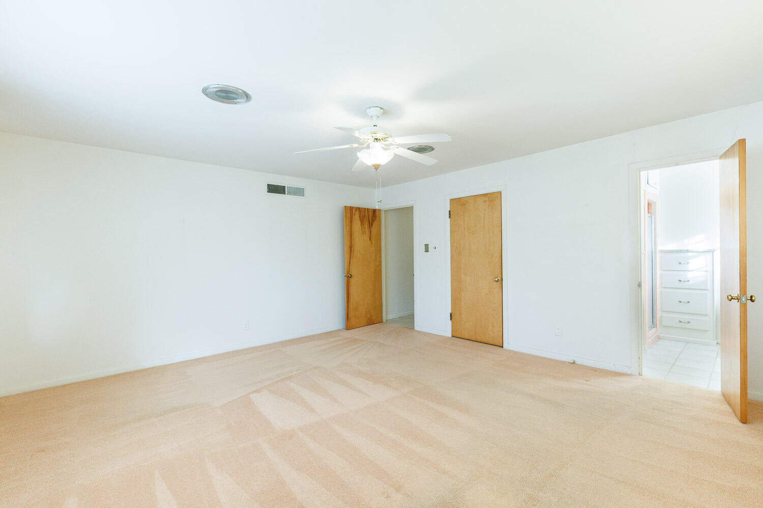 3308 37th Street Lubbock, TX 79413 - Photo 27 of 54 a view of an empty room with a ceiling fan