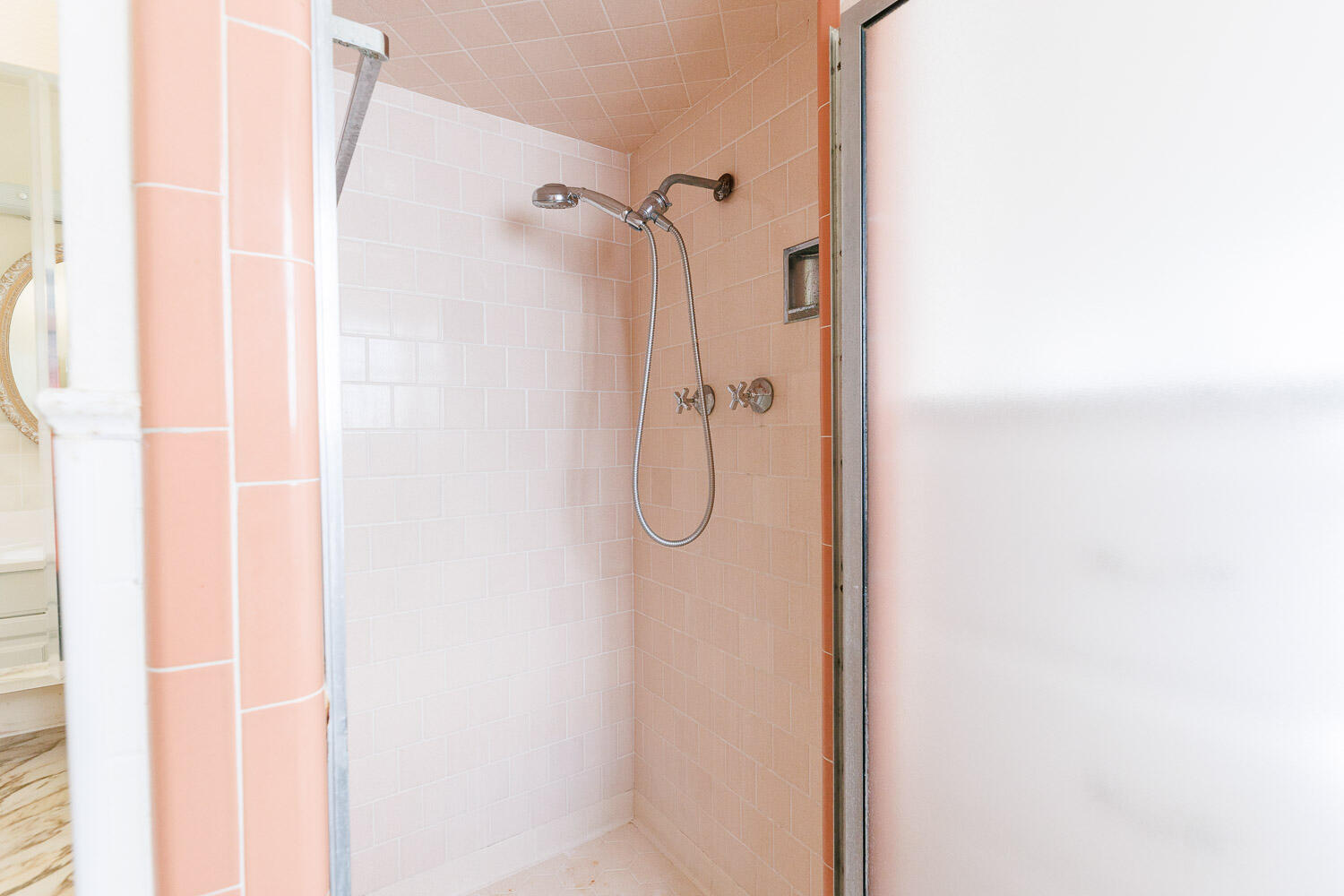 3308 37th Street Lubbock, TX 79413 - Photo 30 of 54 a bathroom with a glass shower door