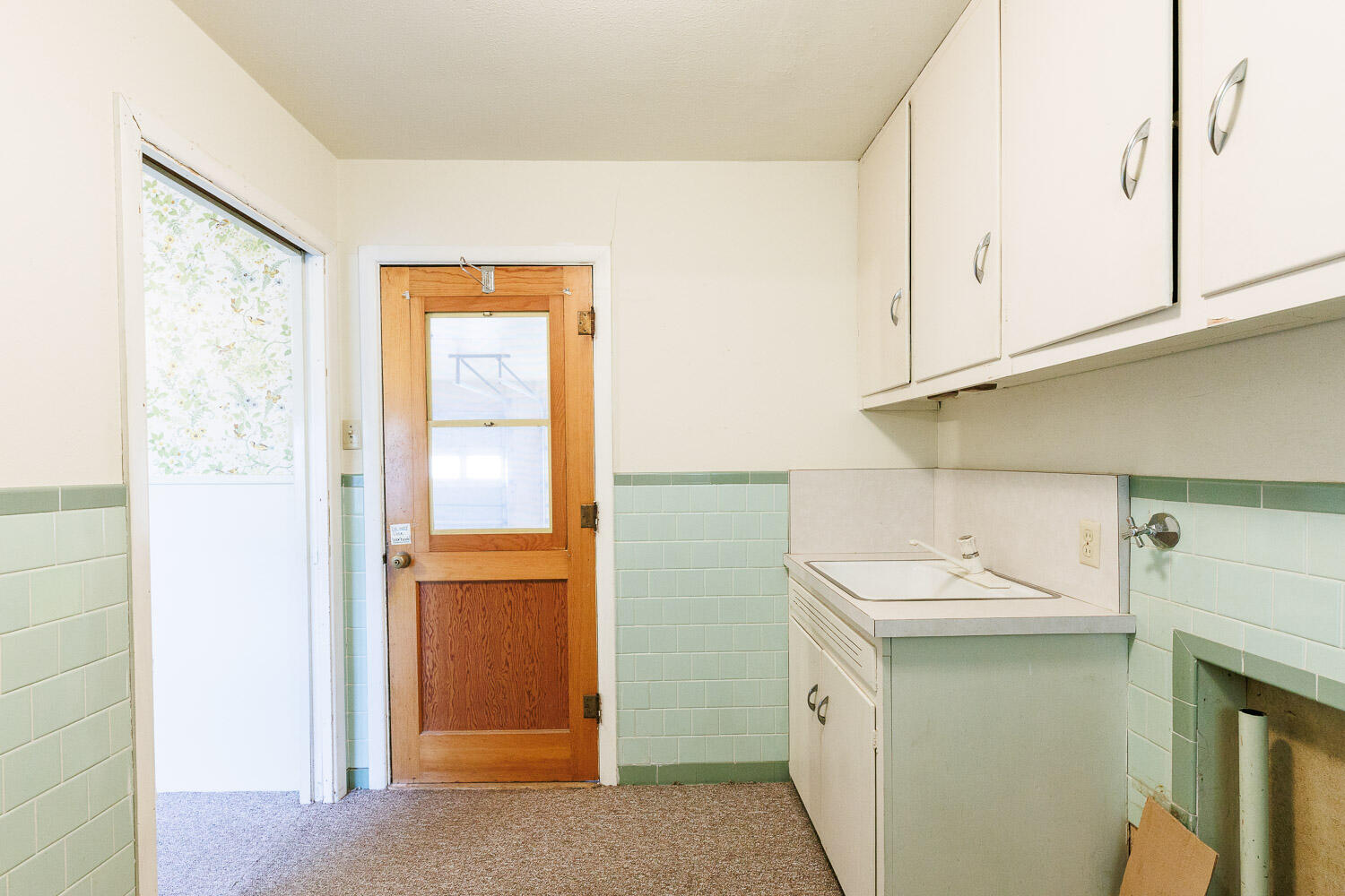 3308 37th Street Lubbock, TX 79413 - Photo 39 of 54 a bathroom with a sink a toilet and a window