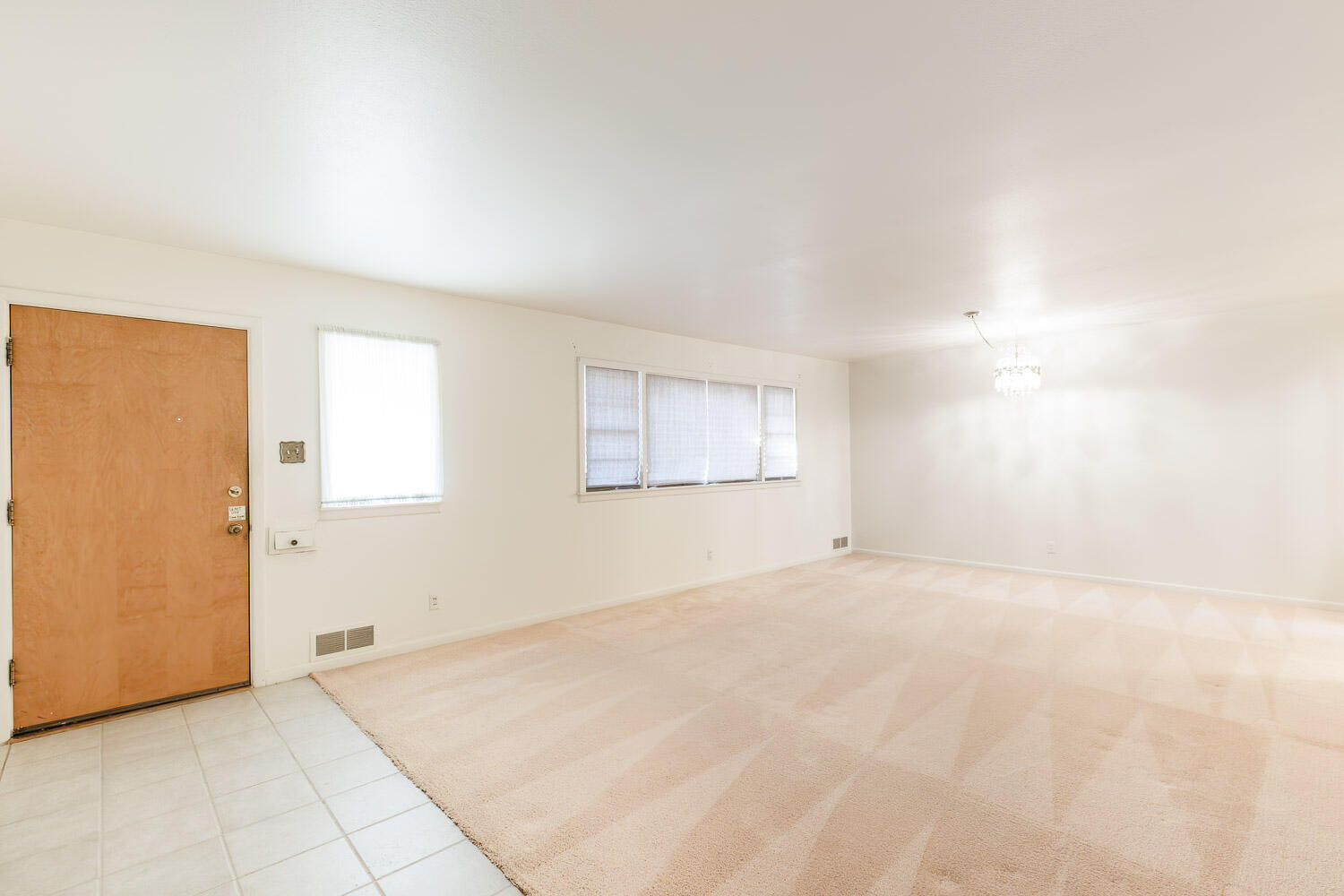3308 37th Street Lubbock, TX 79413 - Photo 4 of 54 a view of an empty room with a window