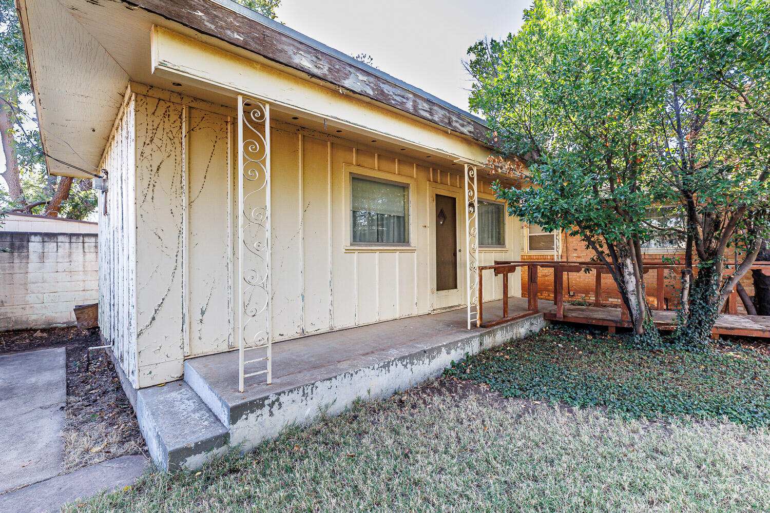 3308 37th Street Lubbock, TX 79413 - Photo 42 of 54 a backyard of a house with seating space