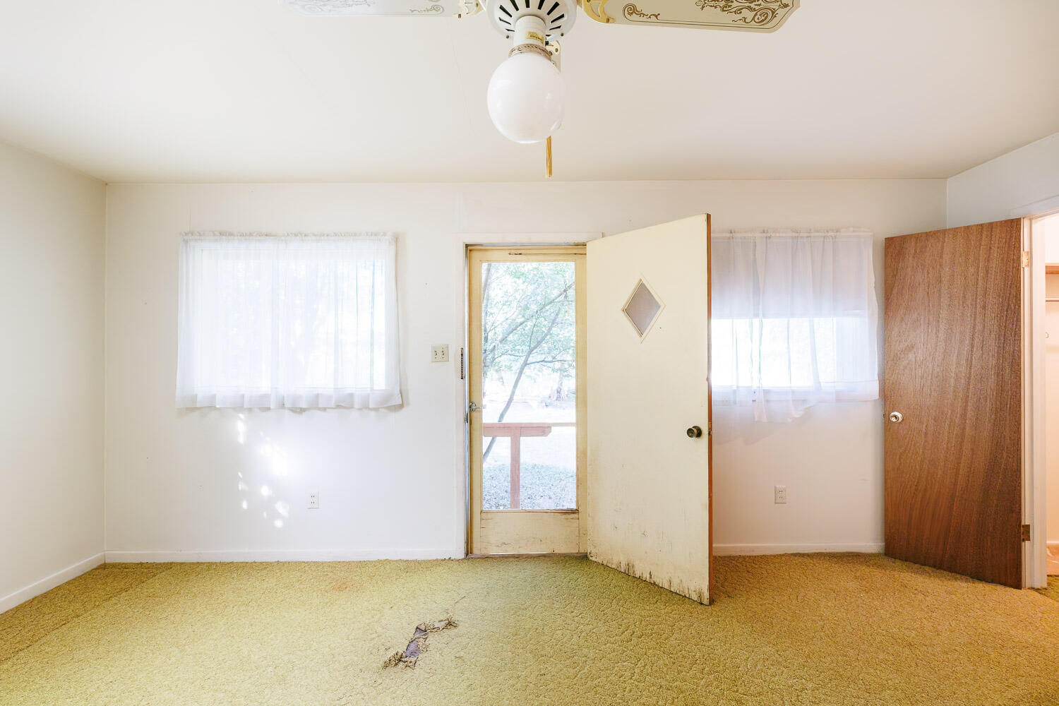 3308 37th Street Lubbock, TX 79413 - Photo 43 of 54 a view of an empty room with a window