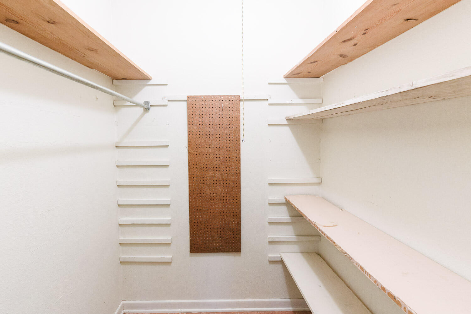 3308 37th Street Lubbock, TX 79413 - Photo 49 of 54 a view of walk in closet with empty racks