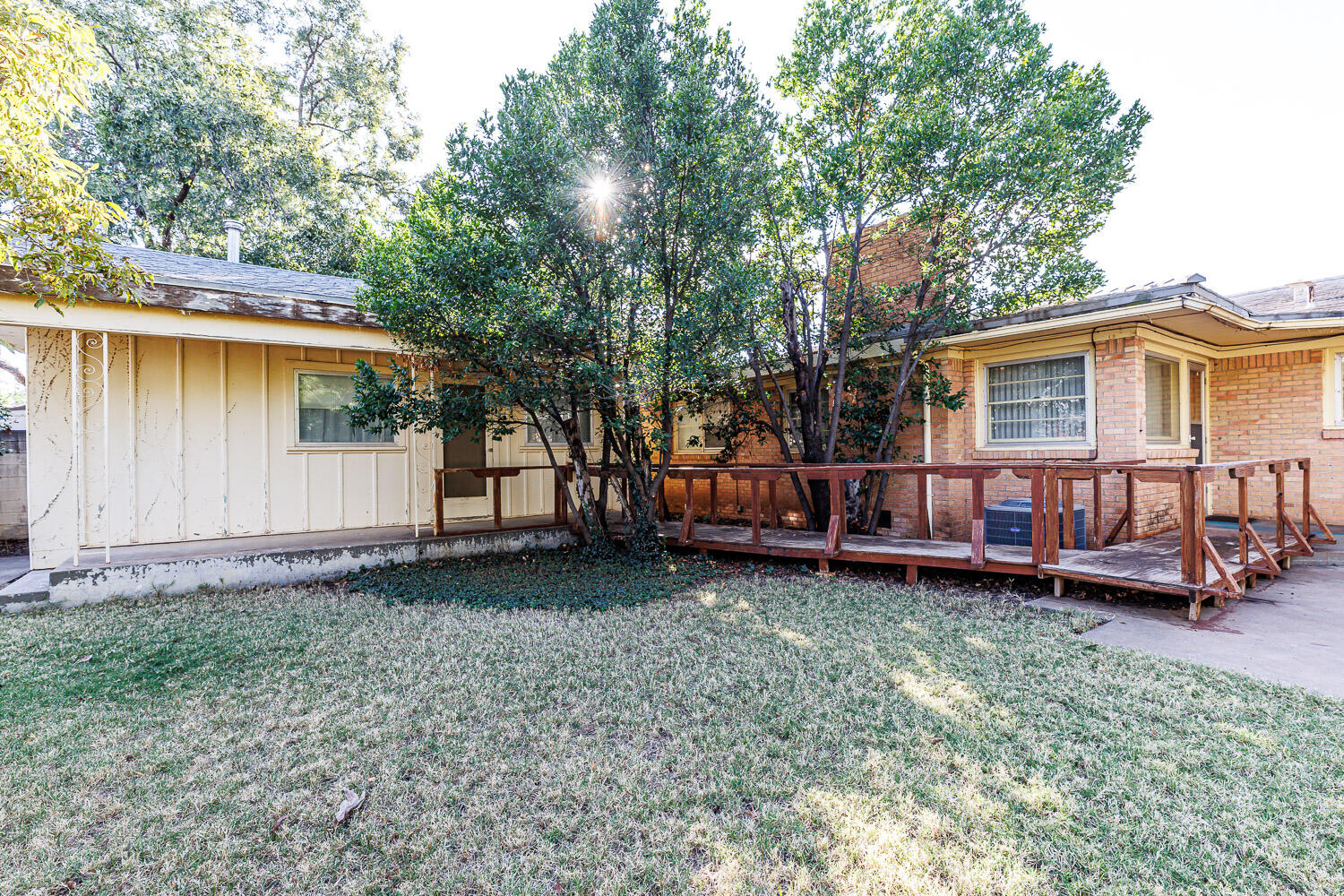 3308 37th Street Lubbock, TX 79413 - Photo 50 of 54 a view of a house with a yard and fence