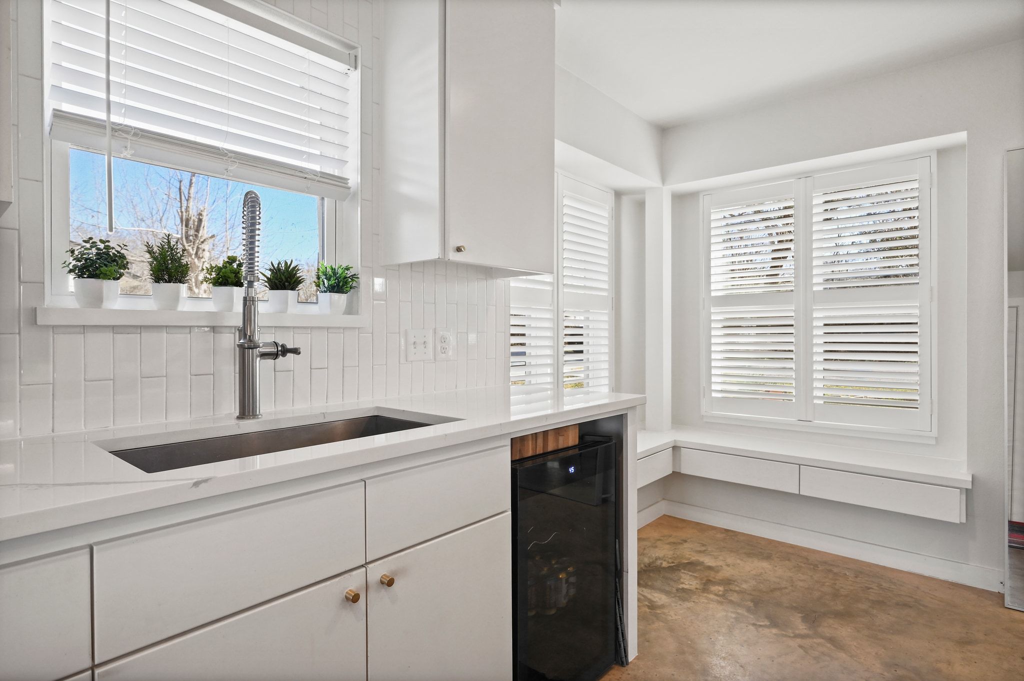 739 Pear Street Lockhart, TX 78644 - Photo 15 of 40 Featuring an undermount sink and a clean, fresh aesthetic, this kitchen offers a timeless design that will remain stylish for years to come.