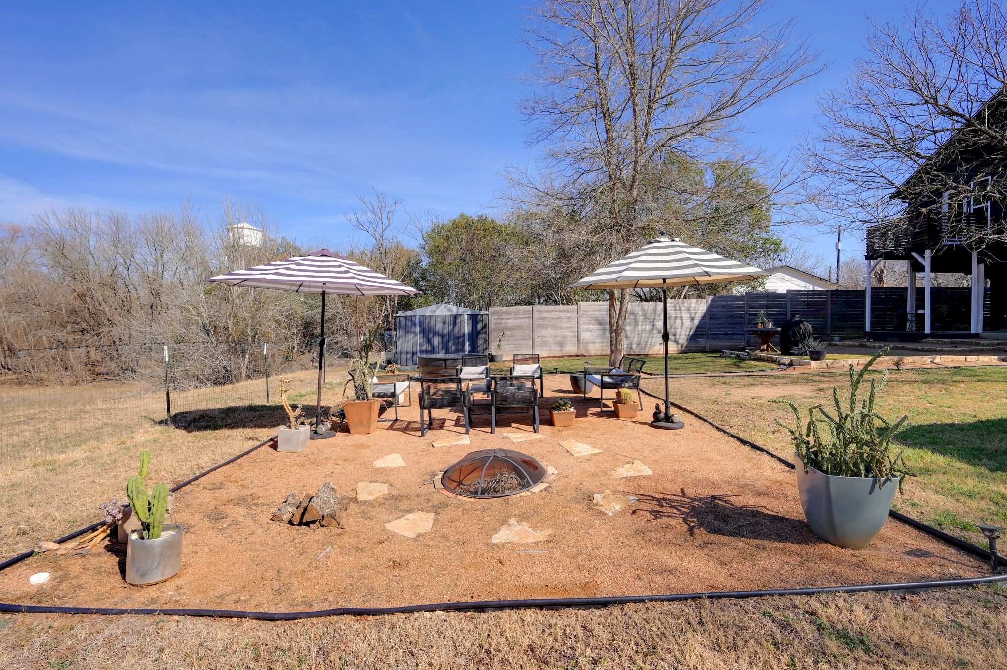 739 Pear Street Lockhart, TX 78644 - Photo 28 of 40 Gather around the fire pit and enjoy those cooler evenings.
