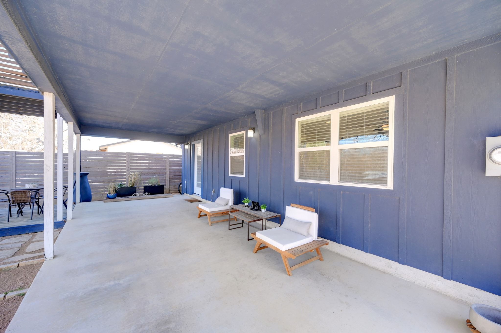 739 Pear Street Lockhart, TX 78644 - Photo 33 of 40 The covered patio spans the entire backside of the home, offering generous outdoor living space.