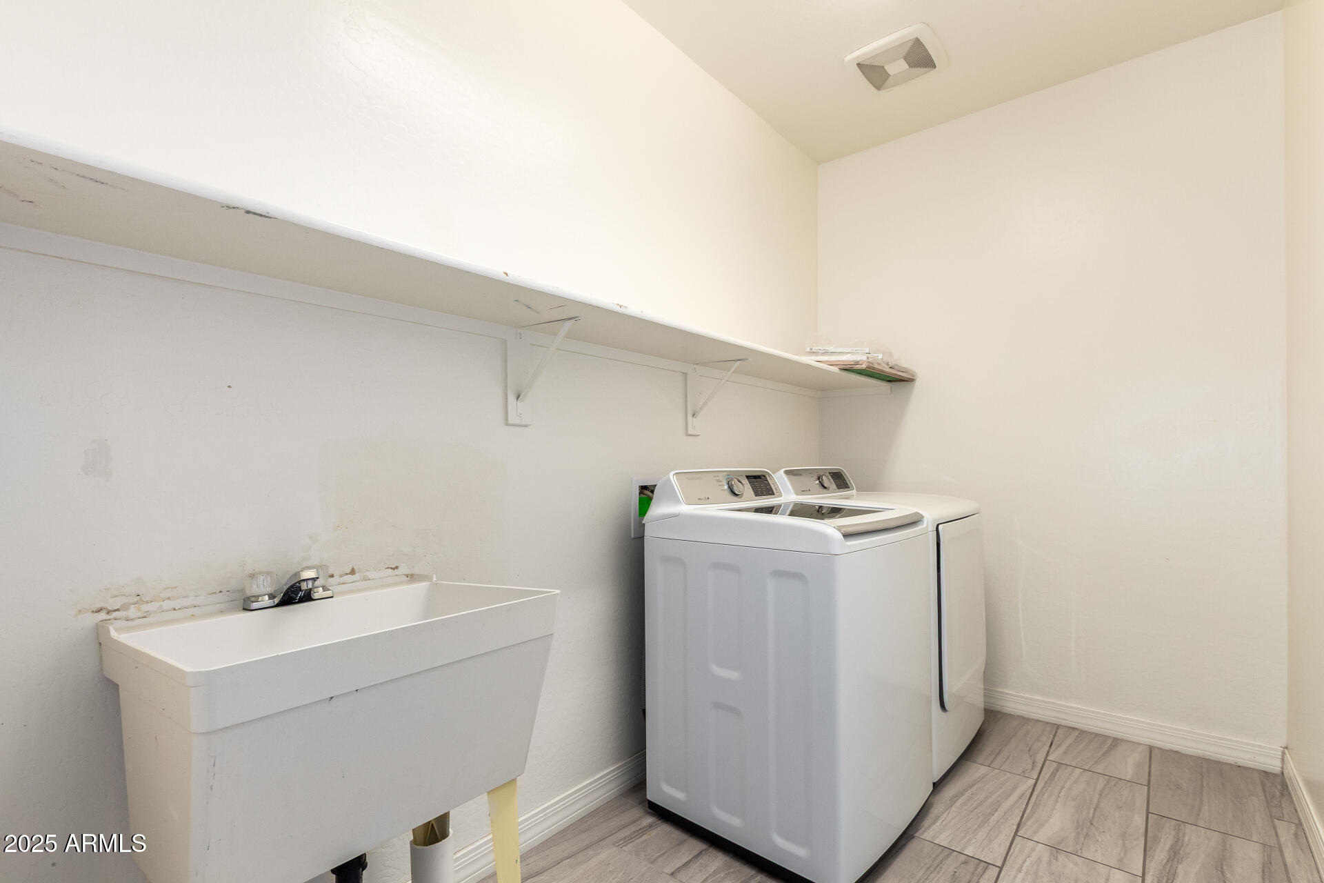 4515 West Pearce Road Laveen, AZ 85339 - Photo 26 of 35 a utility room with dryer and washer