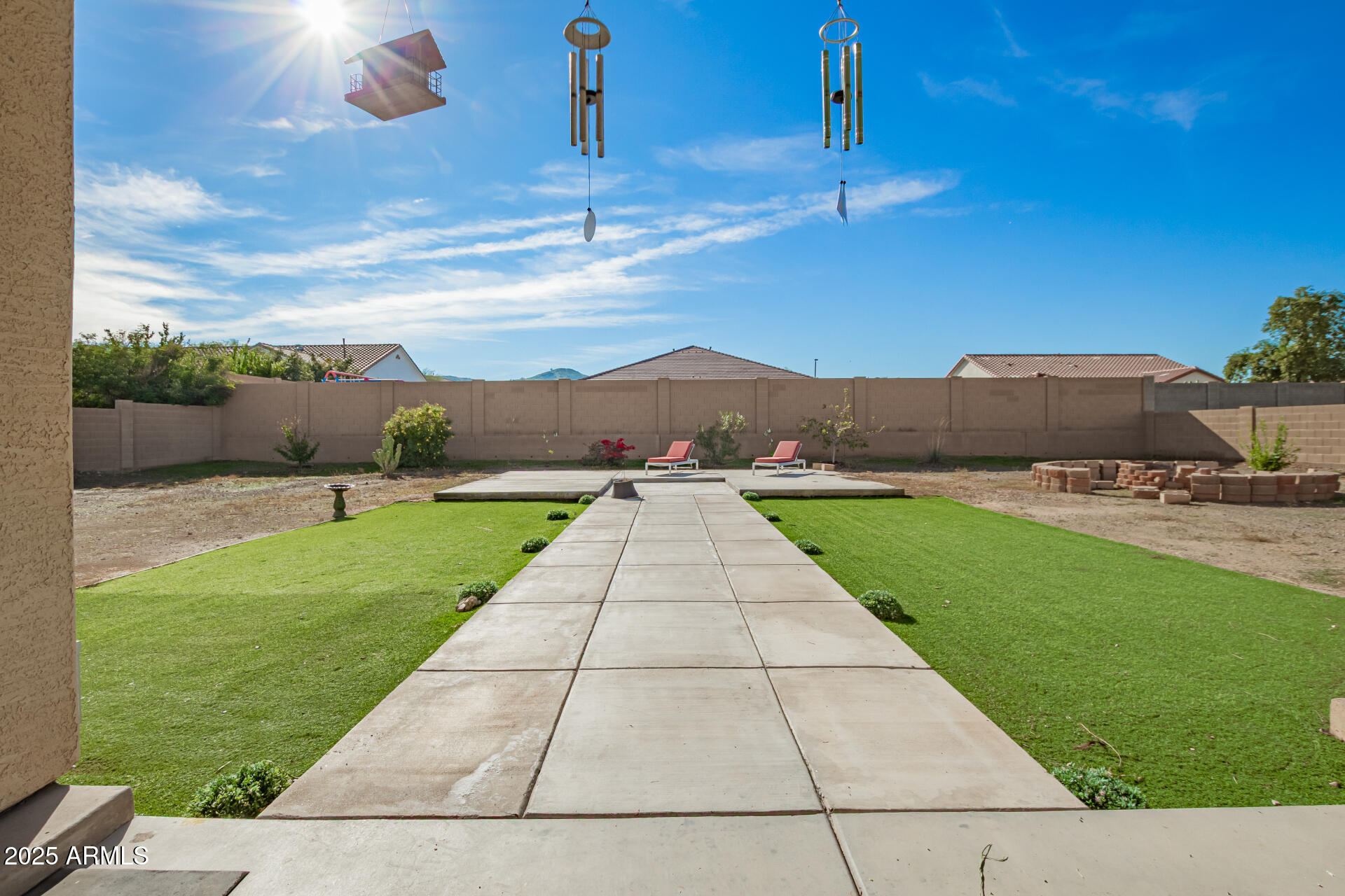 4515 West Pearce Road Laveen, AZ 85339 - Photo 29 of 35 a view of a patio with a yard