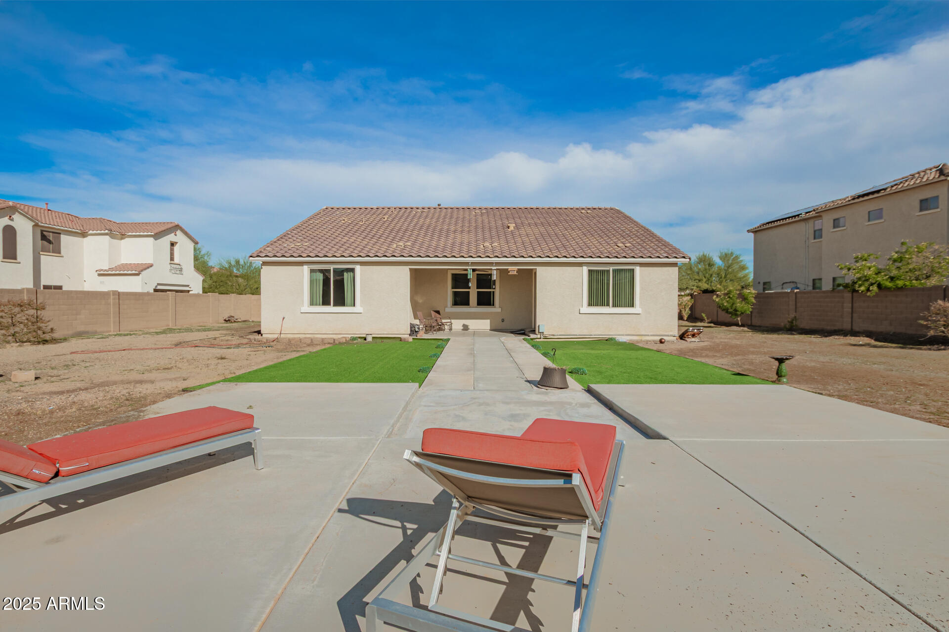 4515 West Pearce Road Laveen, AZ 85339 - Photo 32 of 35 a front view of house with yard and green space
