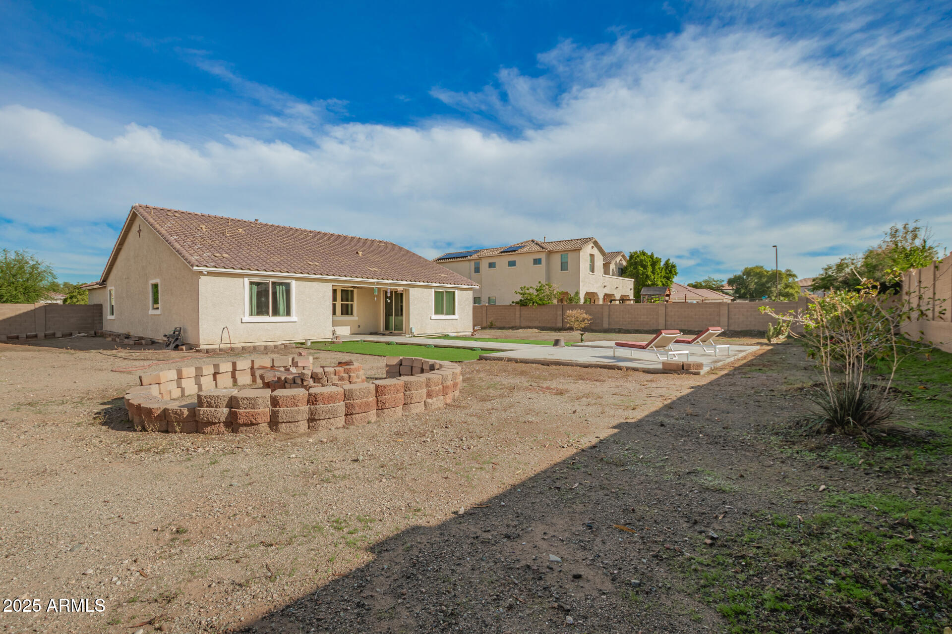 4515 West Pearce Road Laveen, AZ 85339 - Photo 33 of 35 a view of a house with a yard