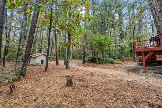 a house with trees in the back yard