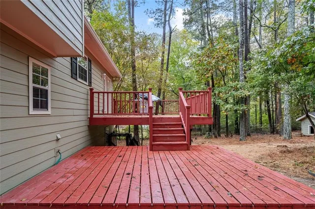 a balcony view with a seating space