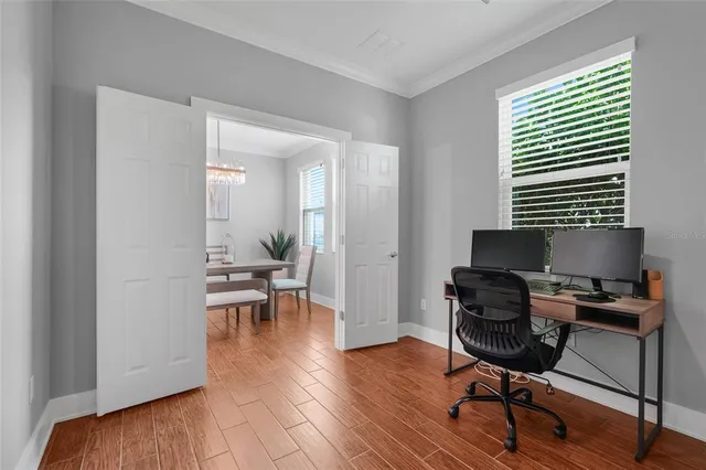 a bedroom with a bed and a lamp