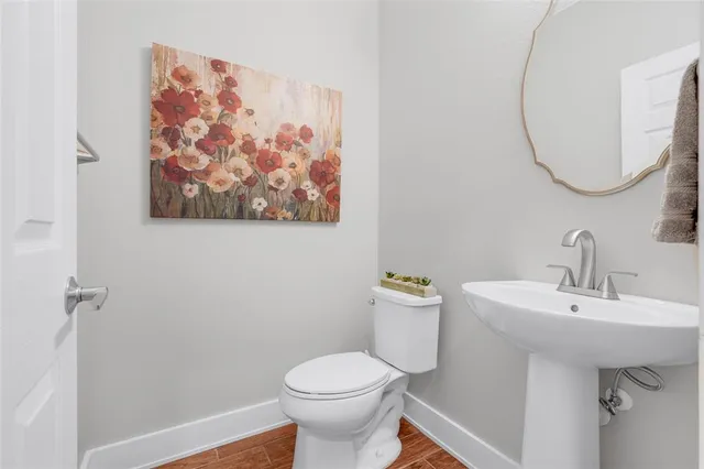 a bedroom with a bed and a television