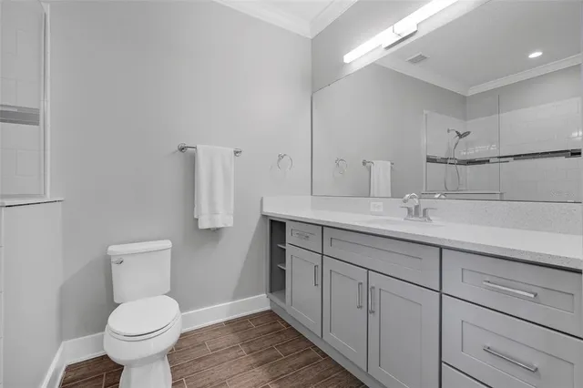 a view of a livingroom with furniture and flat screen tv