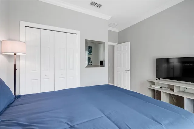 a view of a living room and floor to ceiling window