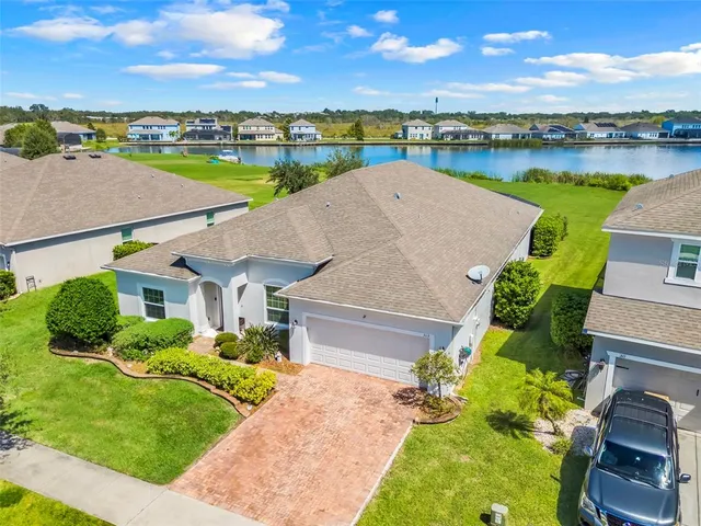 a view of a lake with a big yard