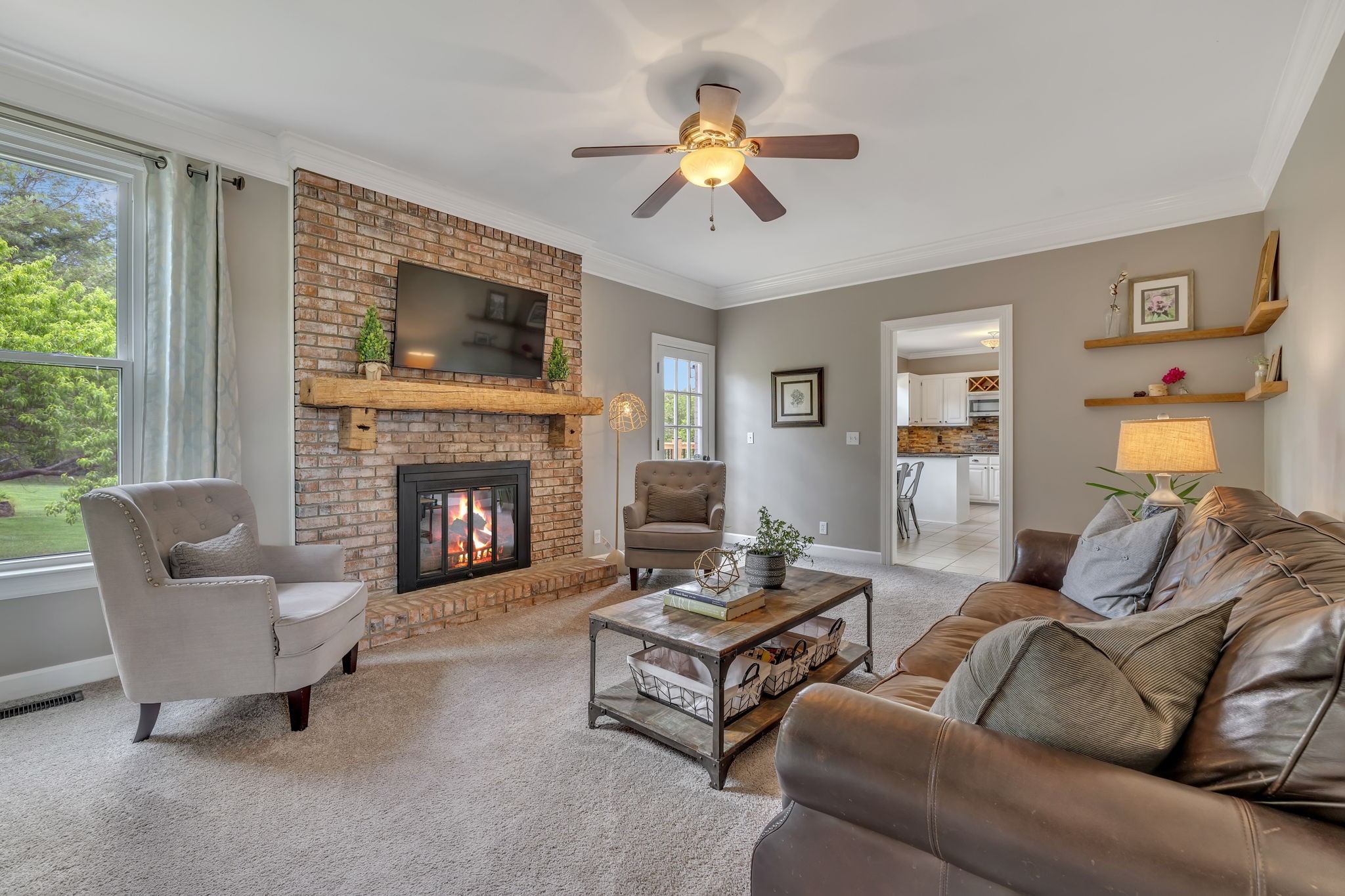 2226 Oakleaf Drive Franklin, TN 37064 - Photo 13 of 70 a living room with furniture and a fireplace