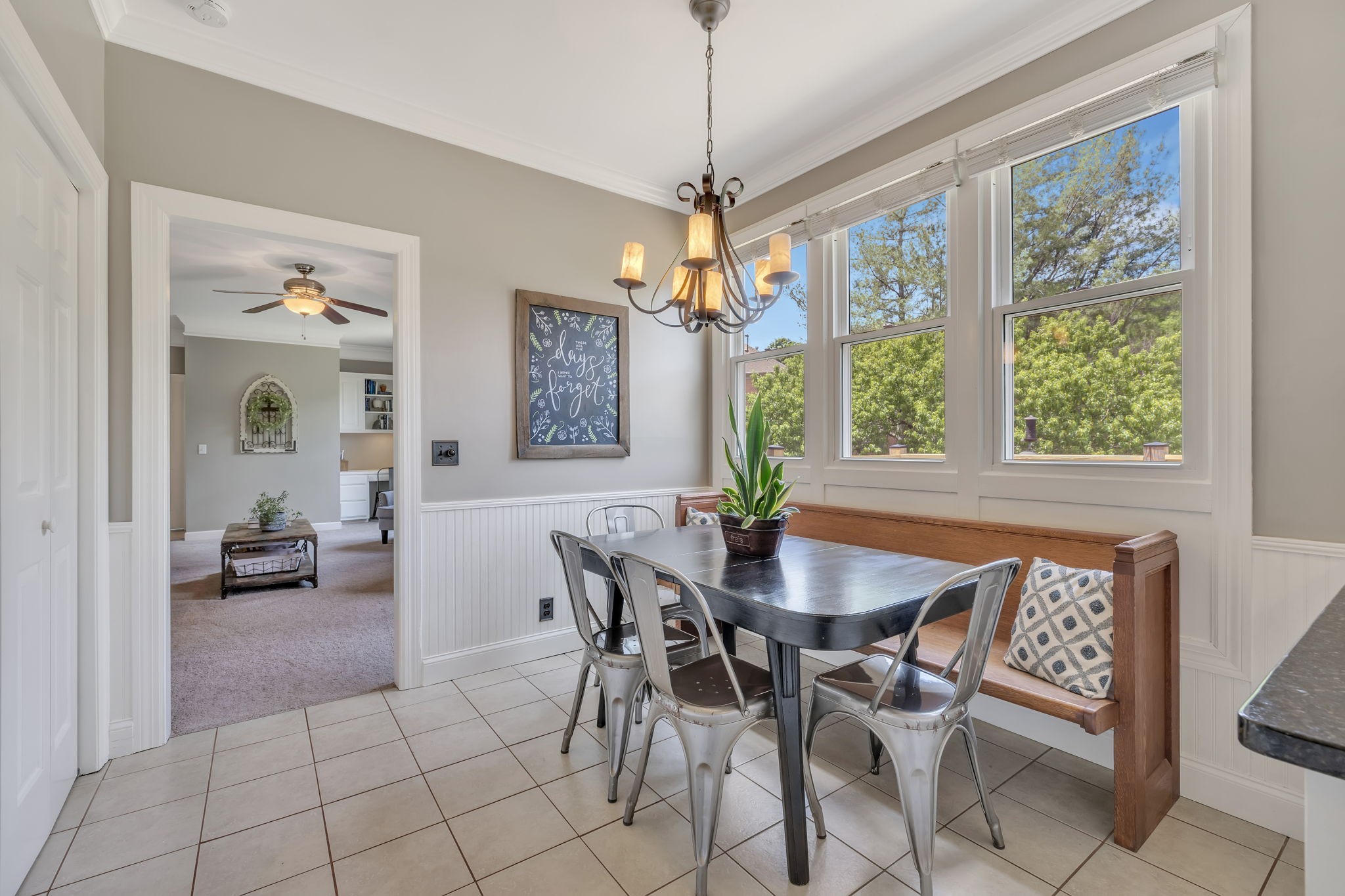2226 Oakleaf Drive Franklin, TN 37064 - Photo 18 of 70 a view of a dining room with furniture wooden floor and chandelier