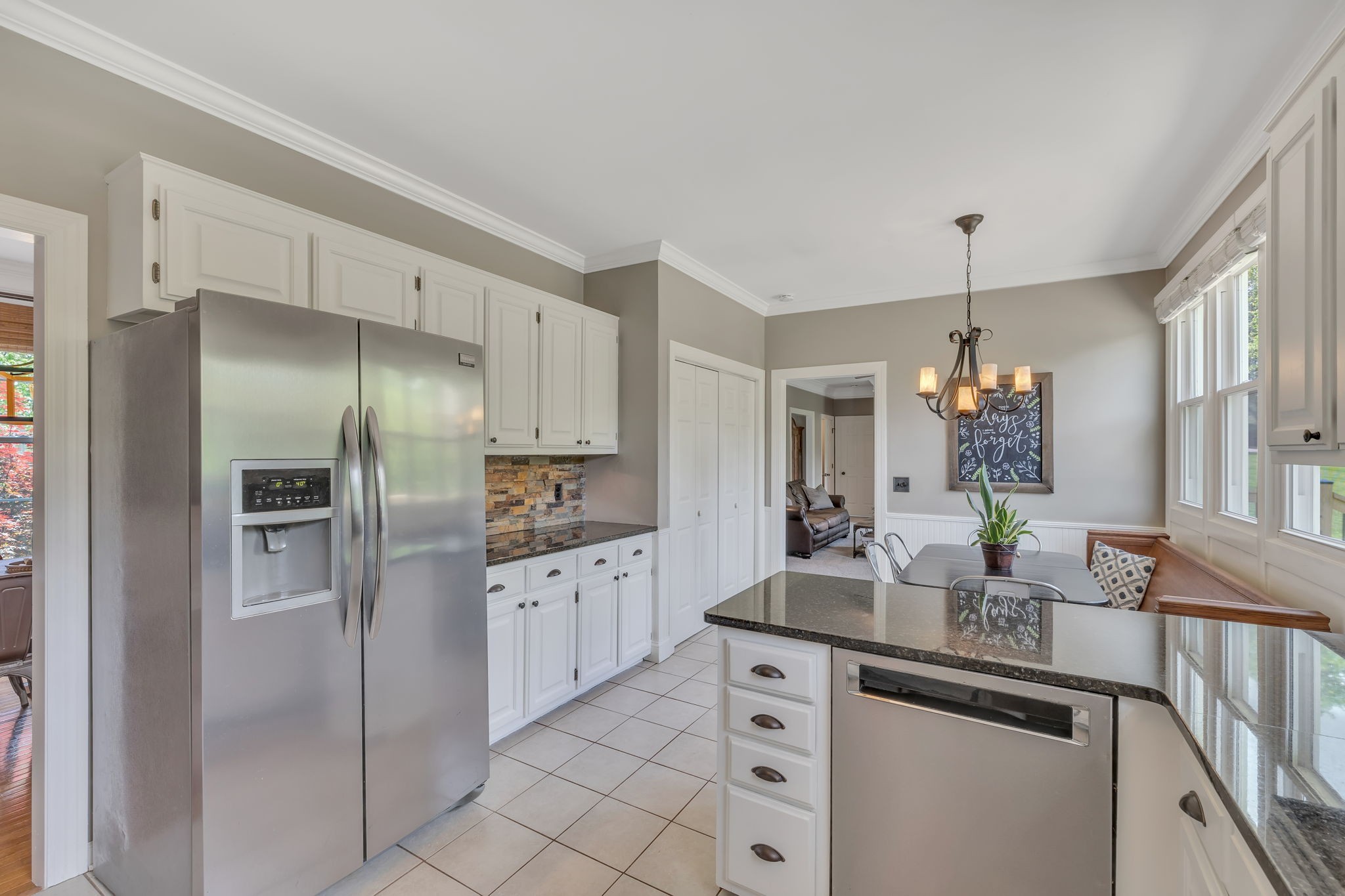 2226 Oakleaf Drive Franklin, TN 37064 - Photo 25 of 70 a kitchen with stainless steel appliances a sink stove and refrigerator