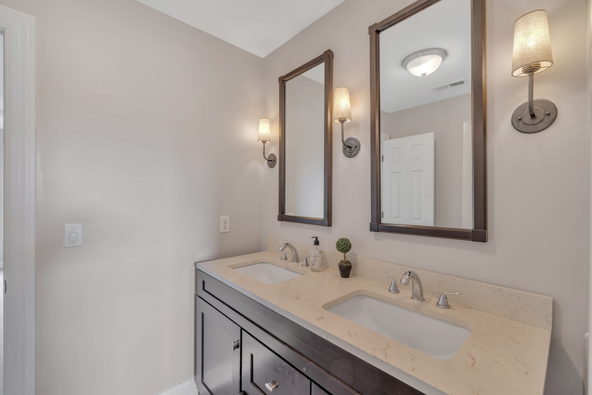 2226 Oakleaf Drive Franklin, TN 37064 - Photo 40 of 70 a bathroom with a sink and a mirror