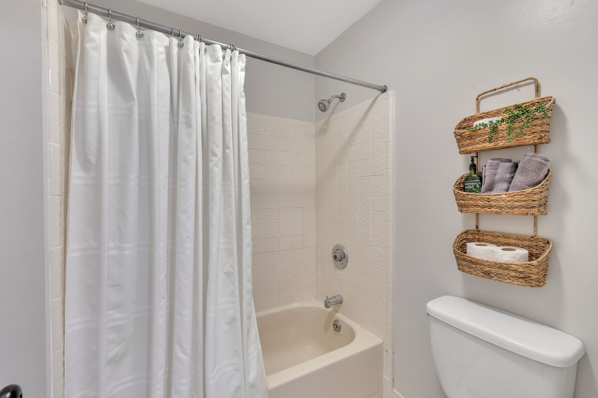 2226 Oakleaf Drive Franklin, TN 37064 - Photo 41 of 70 a white toilet sitting next to a bath tub