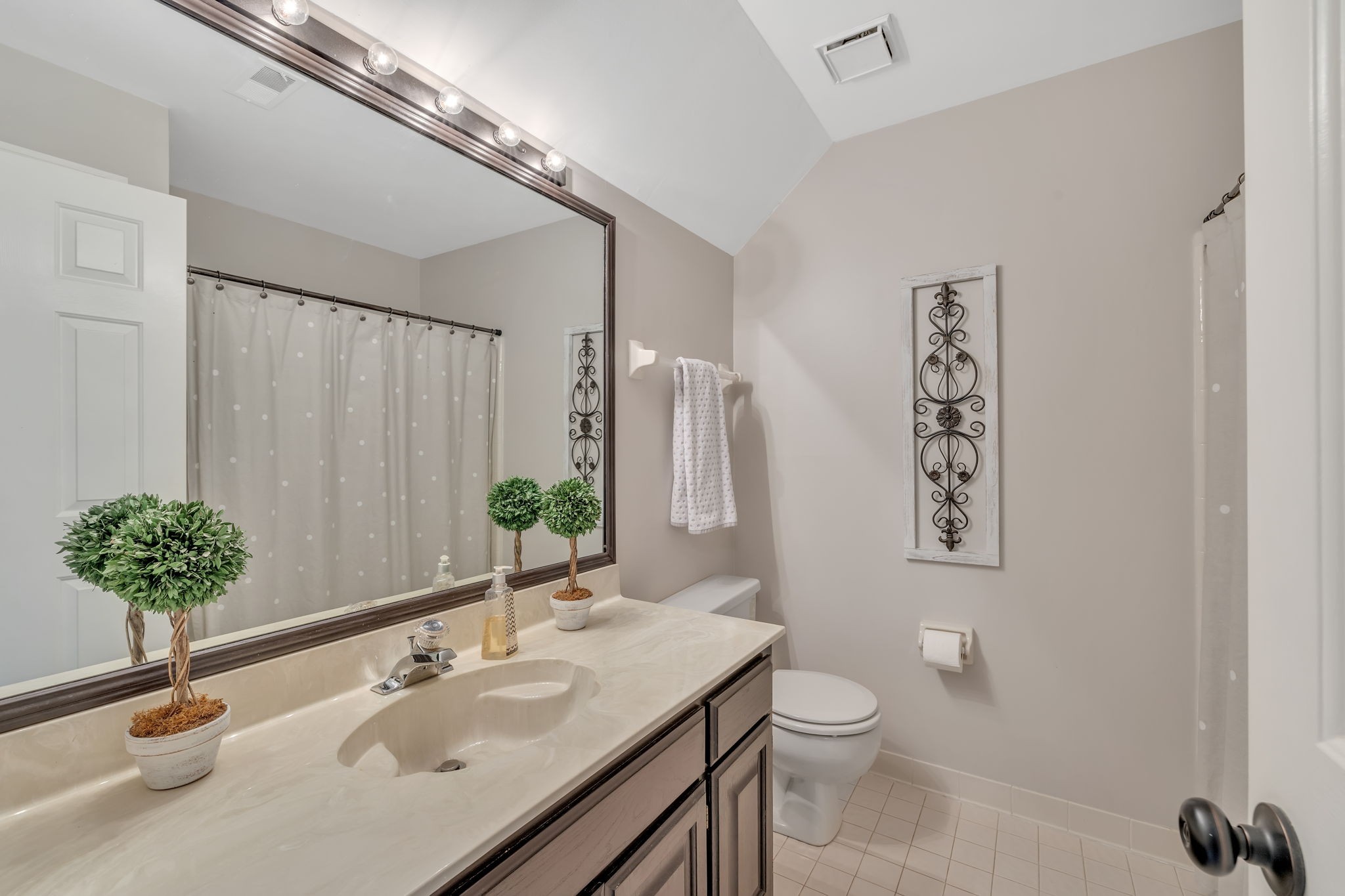 2226 Oakleaf Drive Franklin, TN 37064 - Photo 46 of 70 a bathroom with a toilet a sink and a mirror