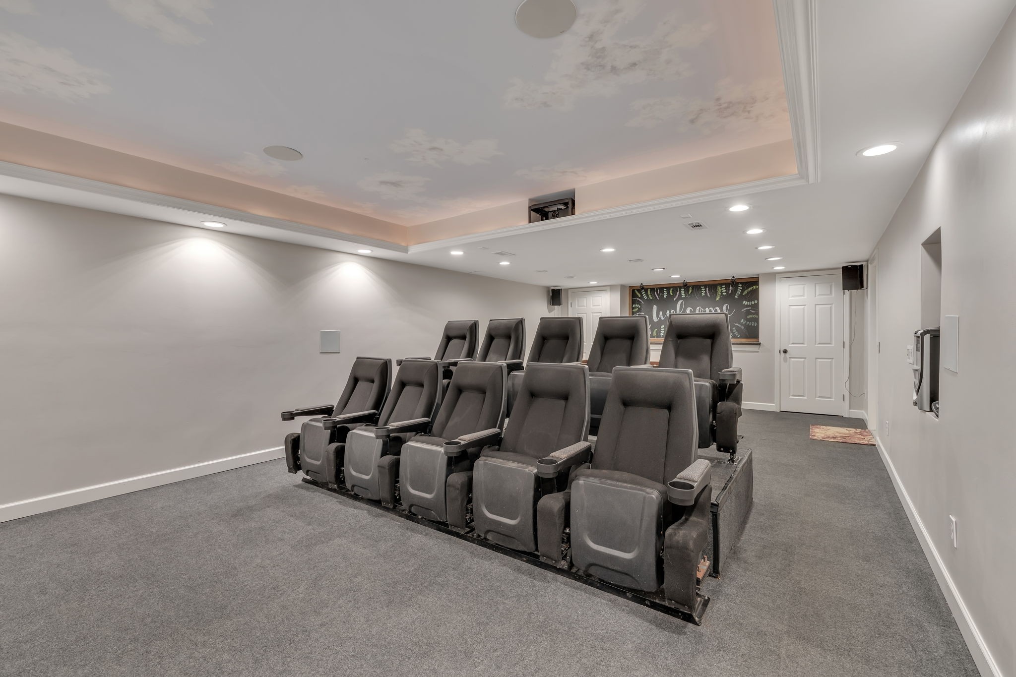 2226 Oakleaf Drive Franklin, TN 37064 - Photo 49 of 70 a media room with lots of chairs and mirrors