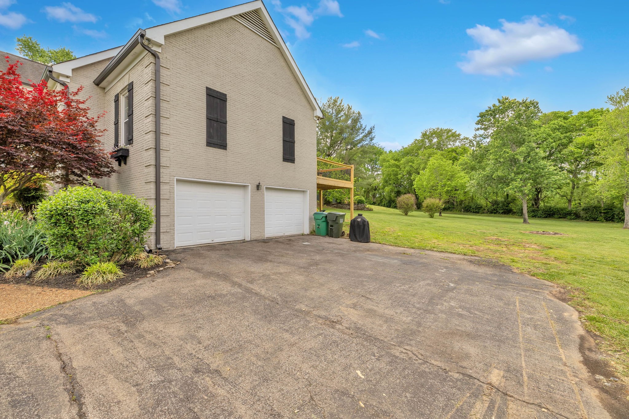 2226 Oakleaf Drive Franklin, TN 37064 - Photo 60 of 70 a view of a house with a yard and garage