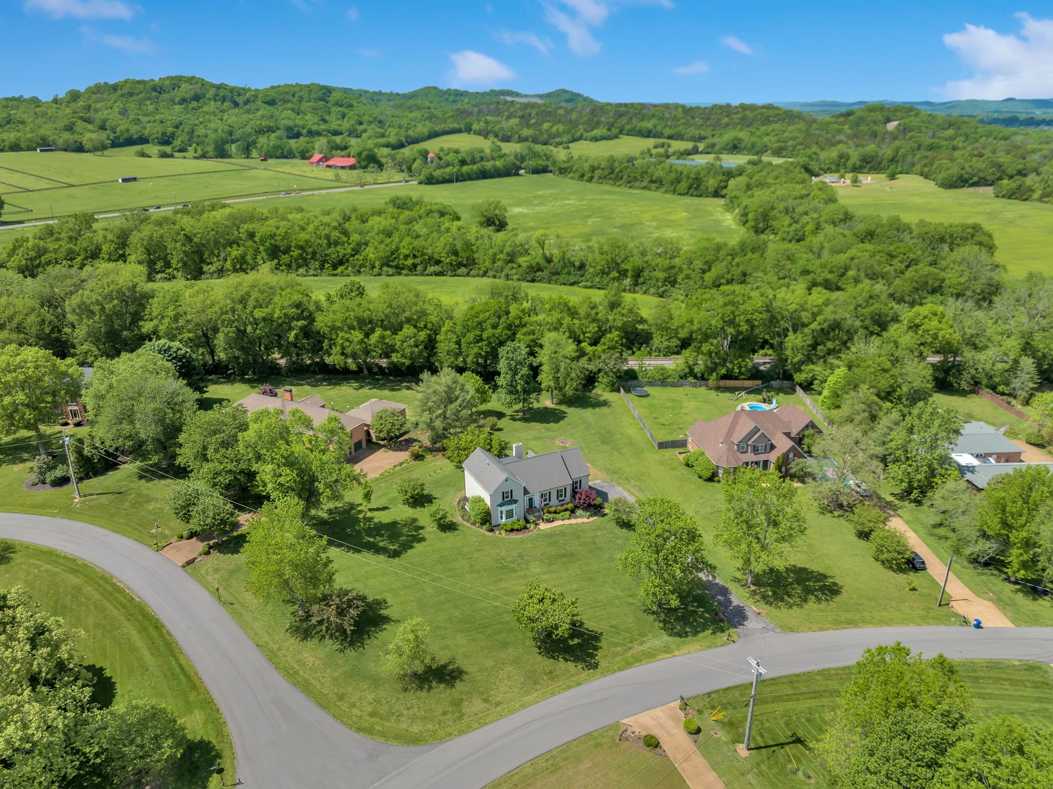 2226 Oakleaf Drive Franklin, TN 37064 - Photo 63 of 70 a view of a lush green forest with trees and houses