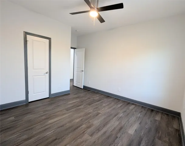 a bathroom with a shower and a sink