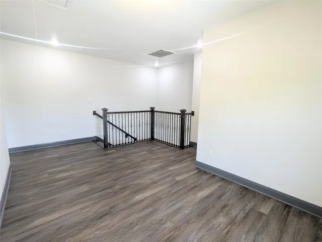 a view of room with hardwood floor