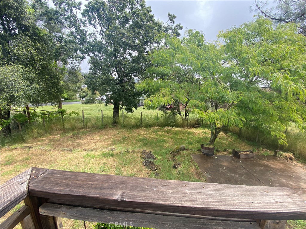 16506 Ridgecrest Court Hidden Valley Lake, CA 95467 - Photo 19 of 25 a view of a wooden floor and a yard