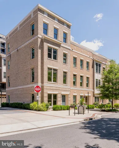 a front view of a building with street view