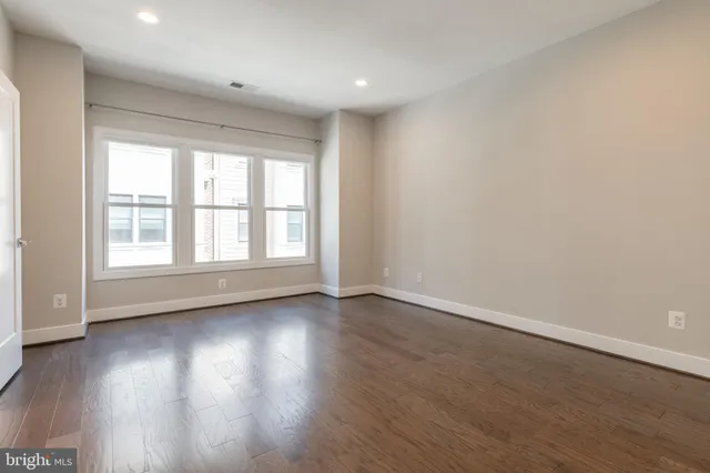 a bathroom with a sink vanity and a mirror