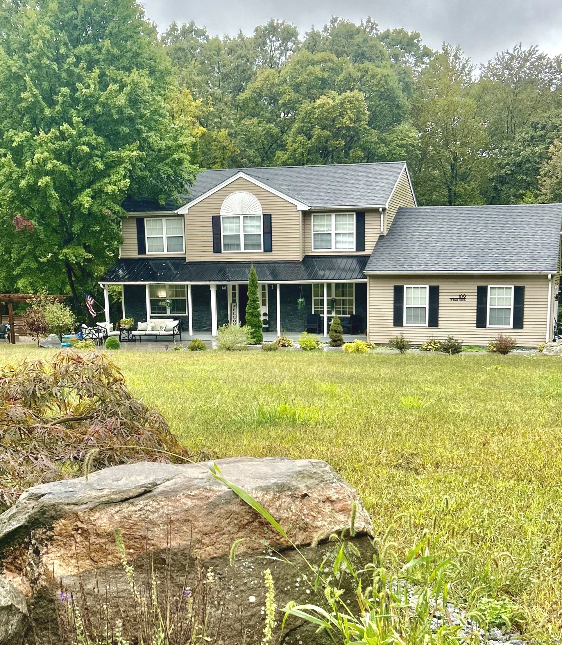 a view of a house with a swimming pool