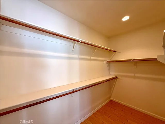 a view of an empty walk in closet